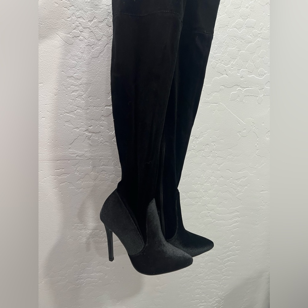 Black high knee boots